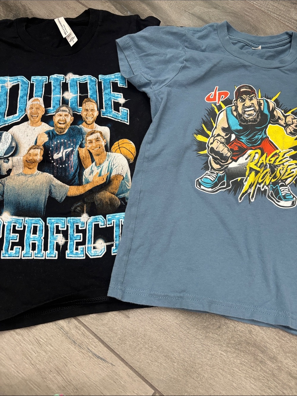 Two kids “Dude Perfect”shirts. “Rage Monster" T & Black Team Graphic Tee - Set
